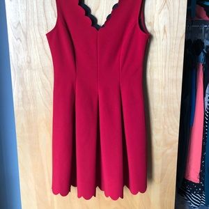 Red Dress with scalloped V front, back, and hem.